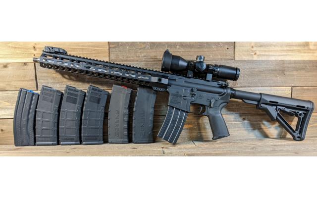 Pre-Owned Bushmaster XM15-E2S 5.56NATO/ .223Remington W/ No Brand Found Optic