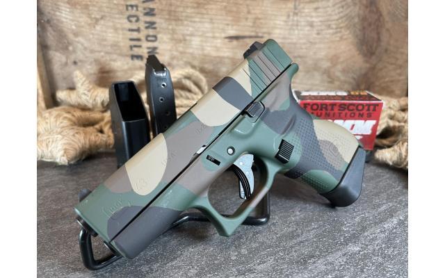 Glock 43 3.39" 9mm, Woodland Camo w/ 20rd Box of Defense Ammo - NEW!