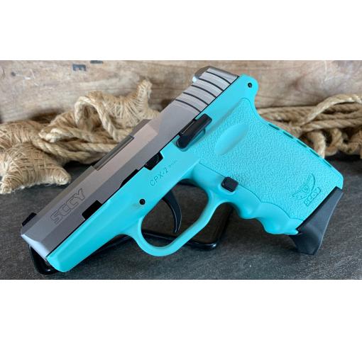New Sccy CPX-2 9mm Turquoise/SS W/ CT Red Dot - harveysauctions.com