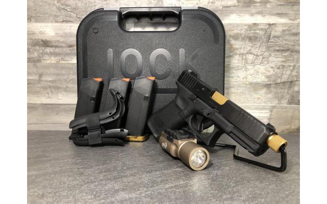 Pre-owned Glock 19 Gen 5 9mm w/ TB in Gold & SureFire X300 Light