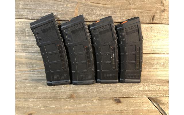 Four pre-owned PMAG AUG Thirty Round Capacity 5.56 NATO Magazines